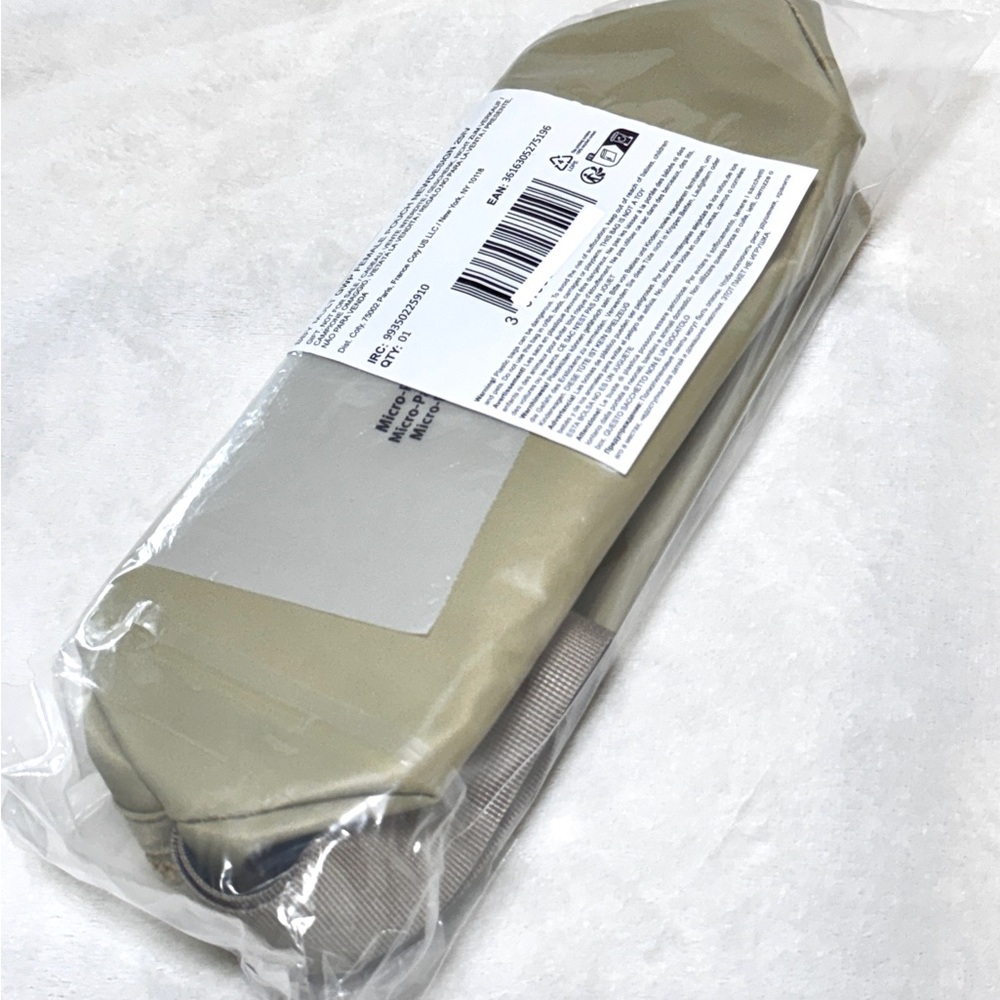 Burberry Beige cosmetics bag.
